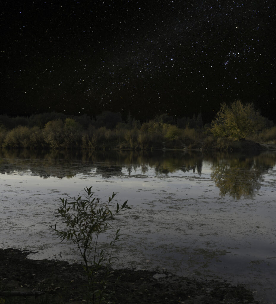 A starry sky over the daytime American River Trail in Sacramento